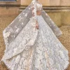 Ivory Three-Dimensional With Exaggerated Pearl Tassels Lehenga Set