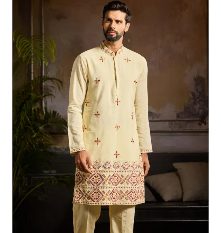 Pastel Yellow Cutdana & Thread Mix Trible Embroidered Kurta Paired With Pastel Yellow Pants