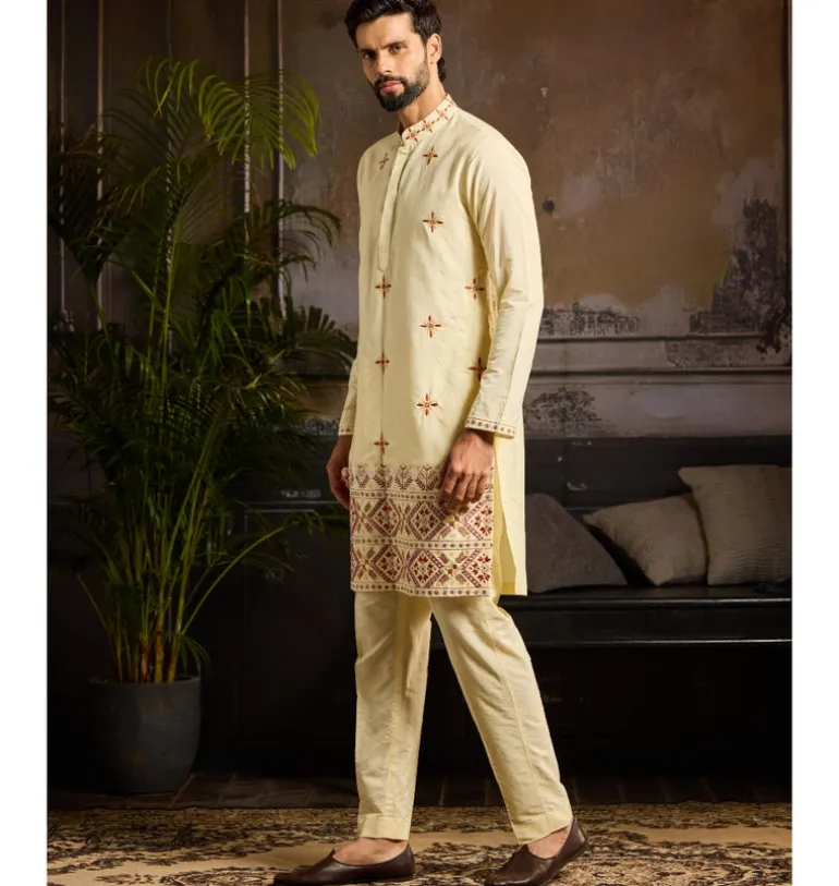 Pastel Yellow Cutdana & Thread Mix Trible Embroidered Kurta Paired With Pastel Yellow Pants