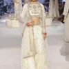 Shakira Off White Embroidered High Low Choli With Sharara And Dupatta Set