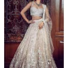 The Contemporary Parsi Aged Peach Lehenga Set
