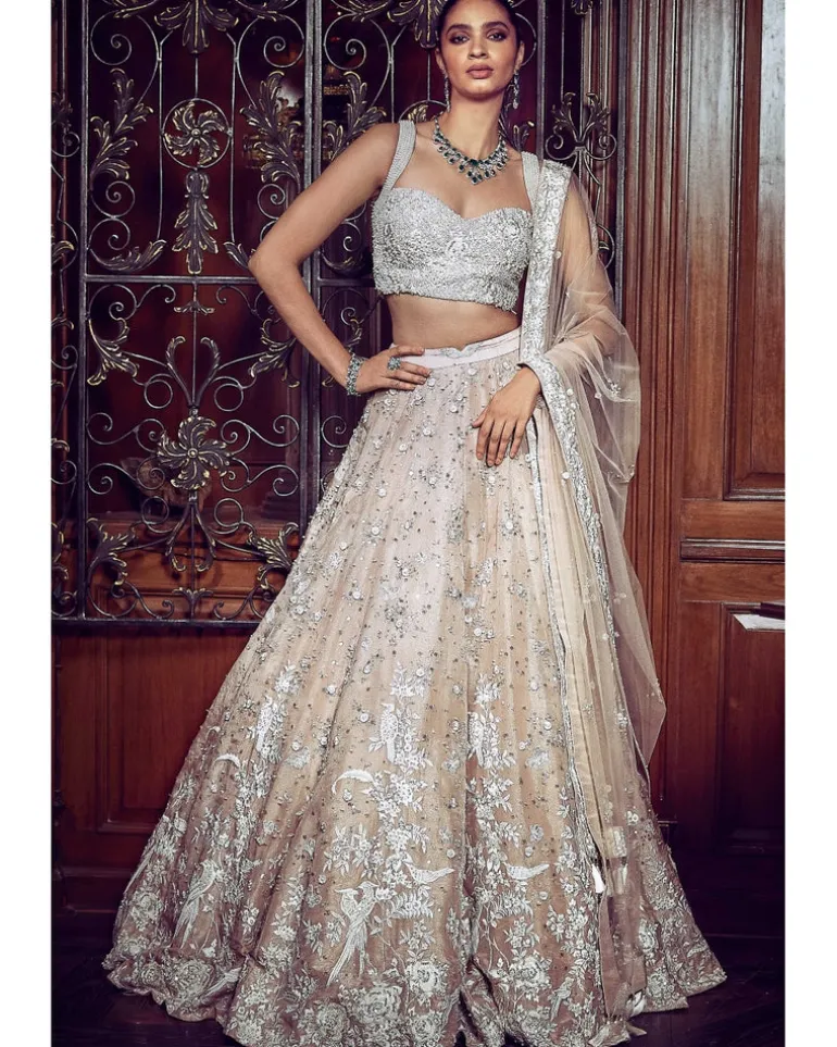 The Contemporary Parsi Aged Peach Lehenga Set