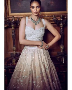 The Contemporary Parsi Aged Peach Lehenga Set
