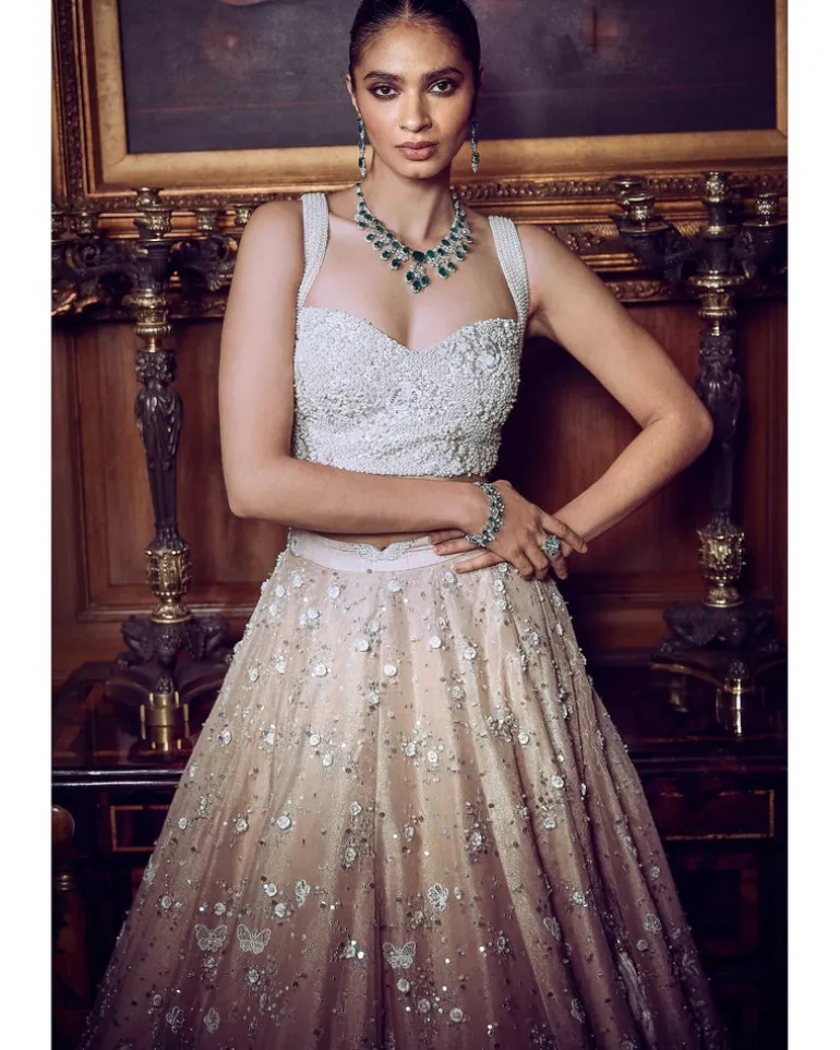 The Contemporary Parsi Aged Peach Lehenga Set