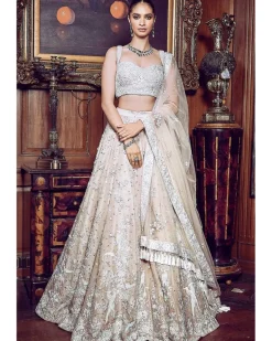 The Contemporary Parsi Aged Peach Lehenga Set