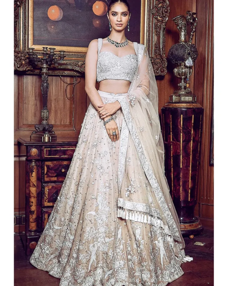 The Contemporary Parsi Aged Peach Lehenga Set