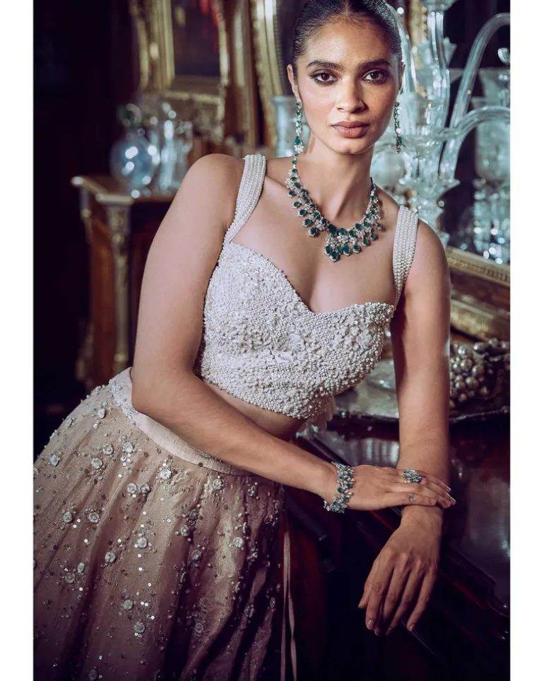 The Contemporary Parsi Aged Peach Lehenga Set