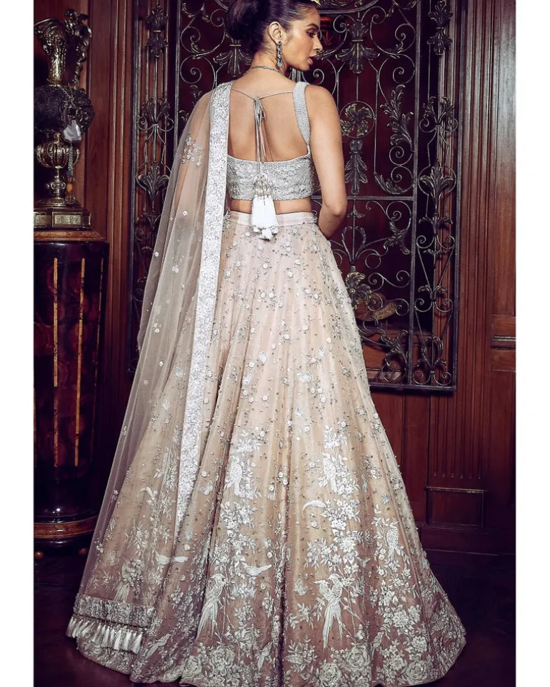 The Contemporary Parsi Aged Peach Lehenga Set