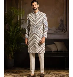 White Chevron Print & Gold Highligted Jacket Paired With White Pants