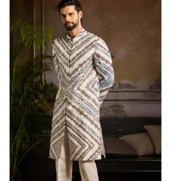 White Chevron Print & Gold Highligted Jacket Paired With White Pants