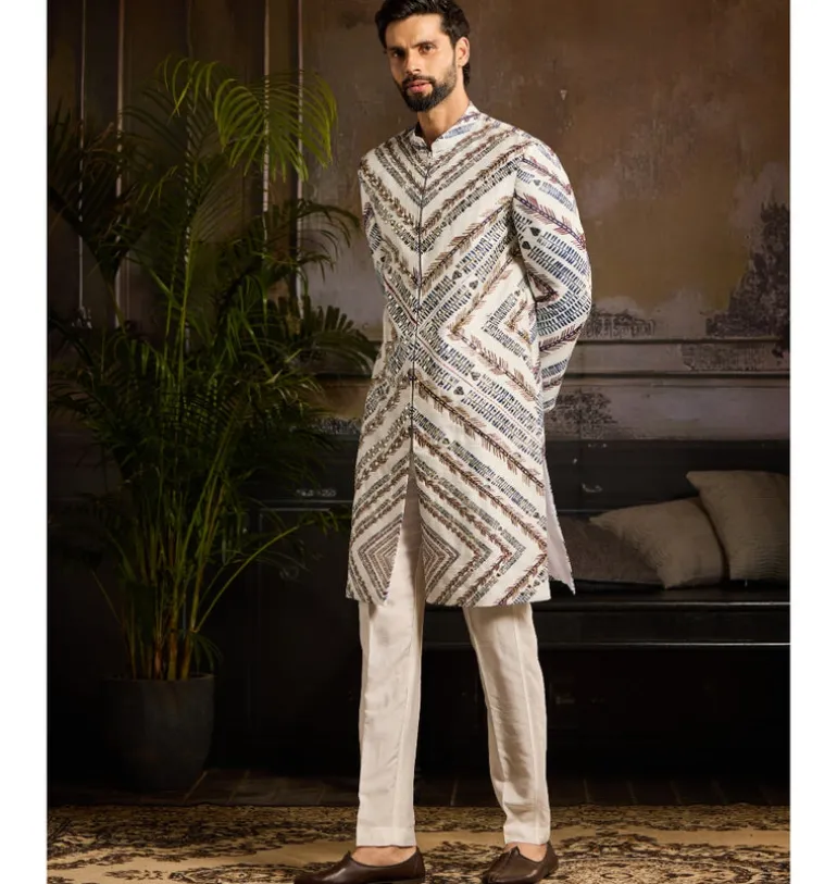 White Chevron Print & Gold Highligted Jacket Paired With White Pants