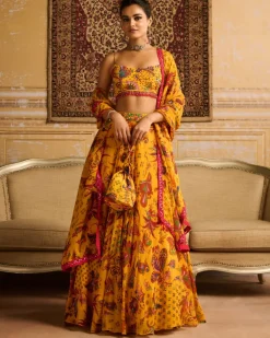 Yellow Highlighted Blouse And Highlighted Lehenga Set